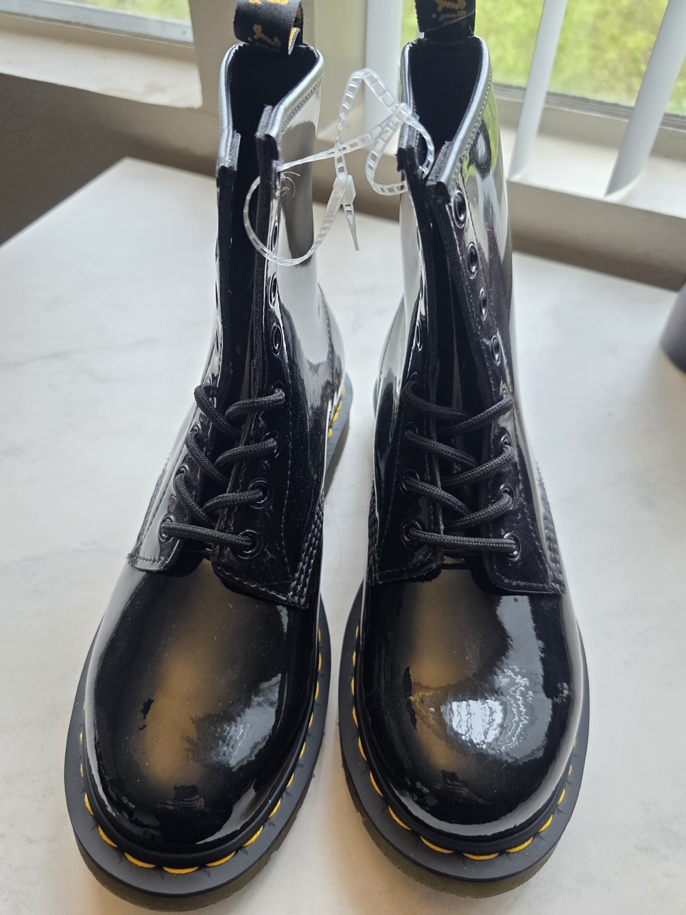 Dr. Martens Black Patent Lace-Up Boots with Yellow Heel Loop
